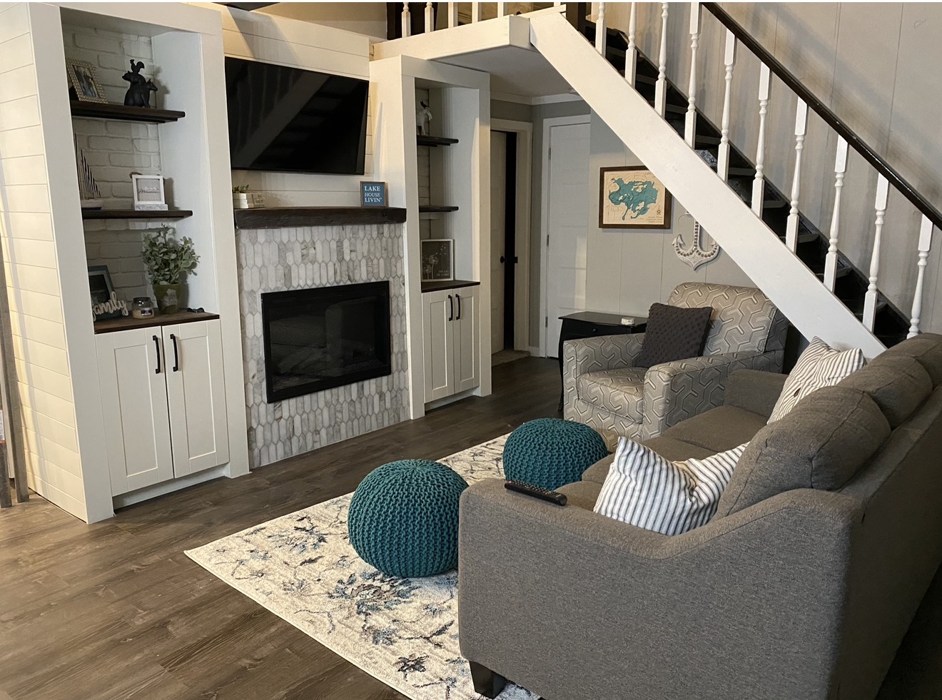 Before and after comparison for Lake House Fireplace + Built-In Storage